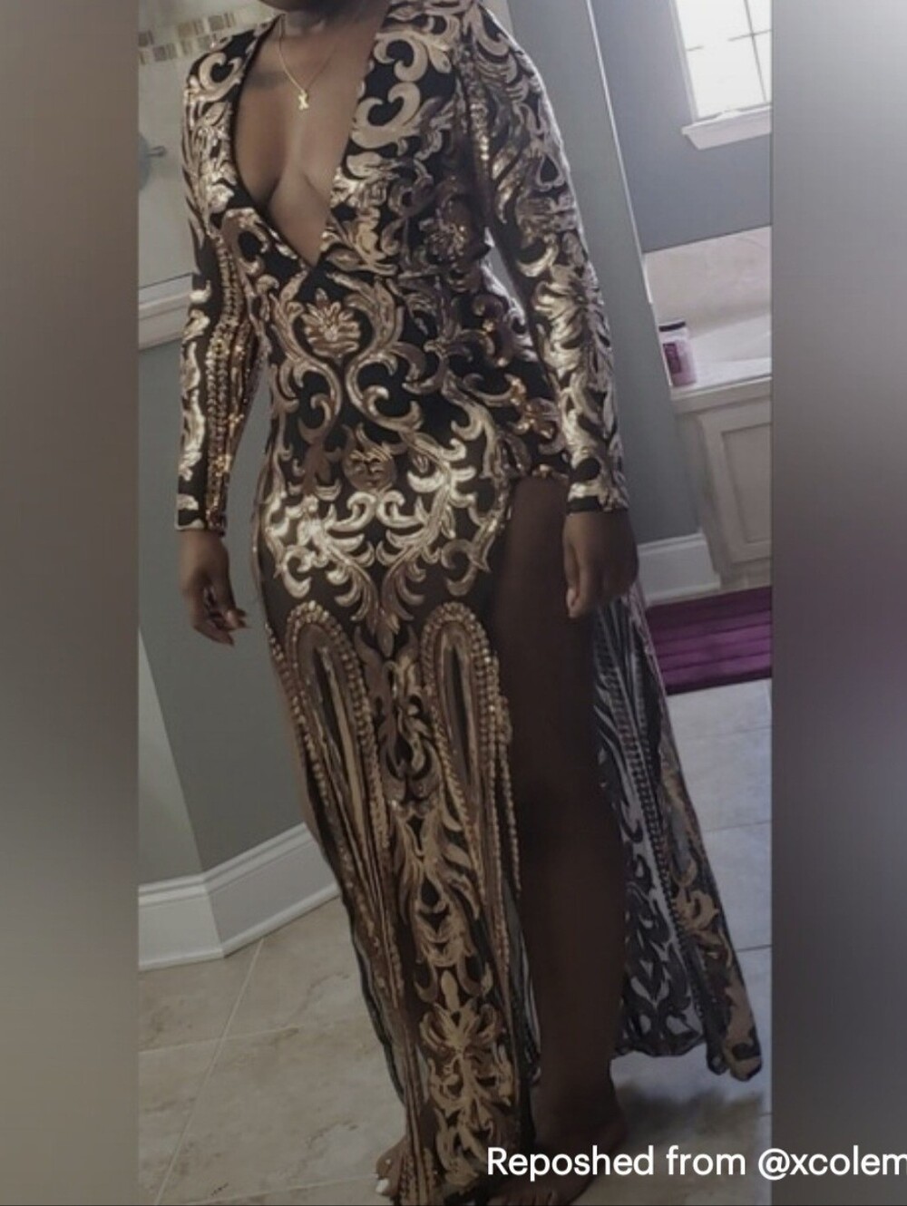Elegant Black and Gold Sequin Evening Gown